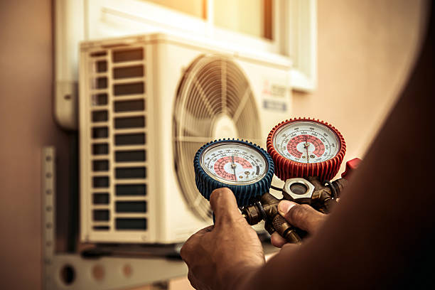 Professional Air Conditioning Service technician working in Opelika, AL